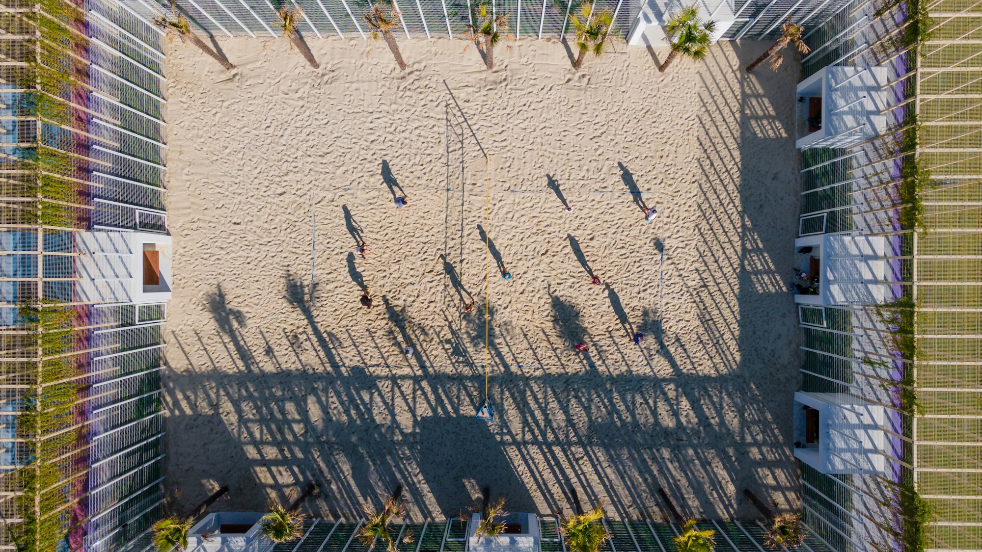 Top view of beach volleyball court in public park. Beach sports competition